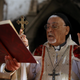 An Iraqi priest holds the first mass at the Grand Immaculate Church since it was recaptured from Islamic State in Qaraqosh